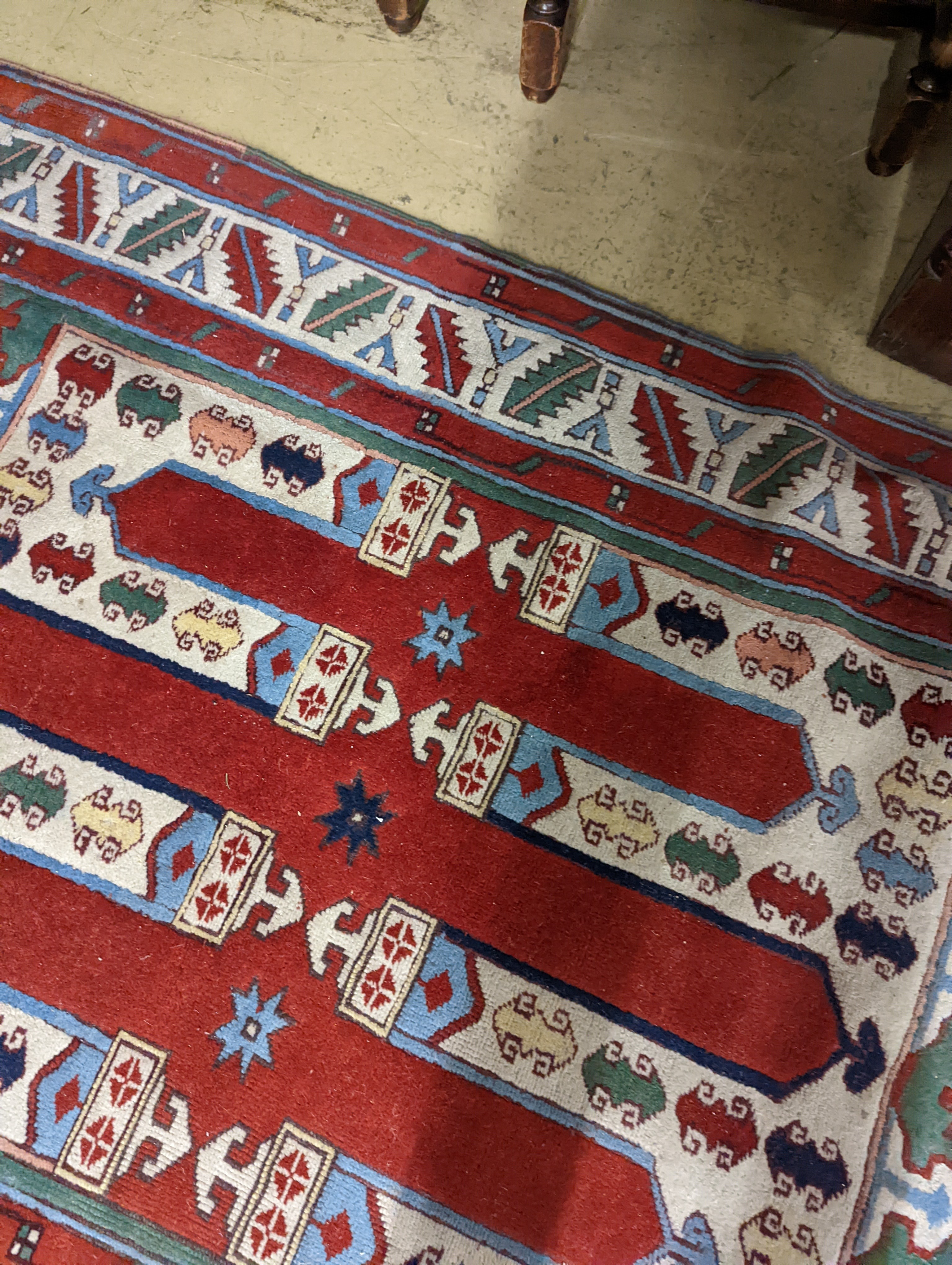 Two Turkish rugs and a Persian rugs. Largest, 284x172cm.